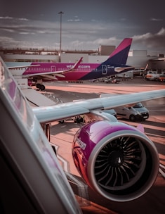a large jetliner sitting on top of an airport tarmac