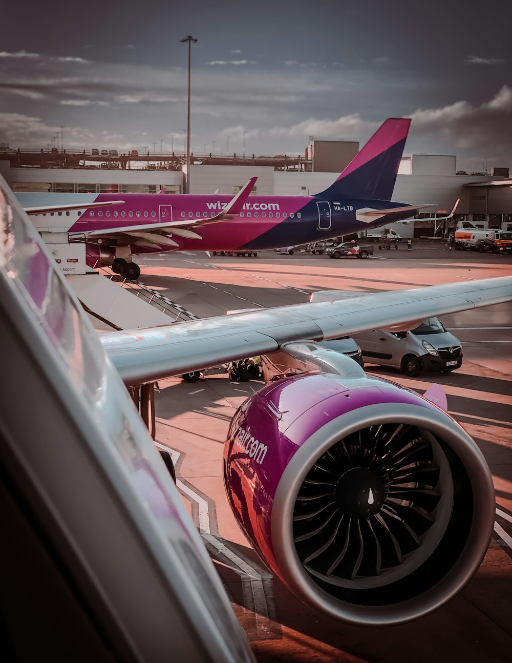 a large jetliner sitting on top of an airport tarmac