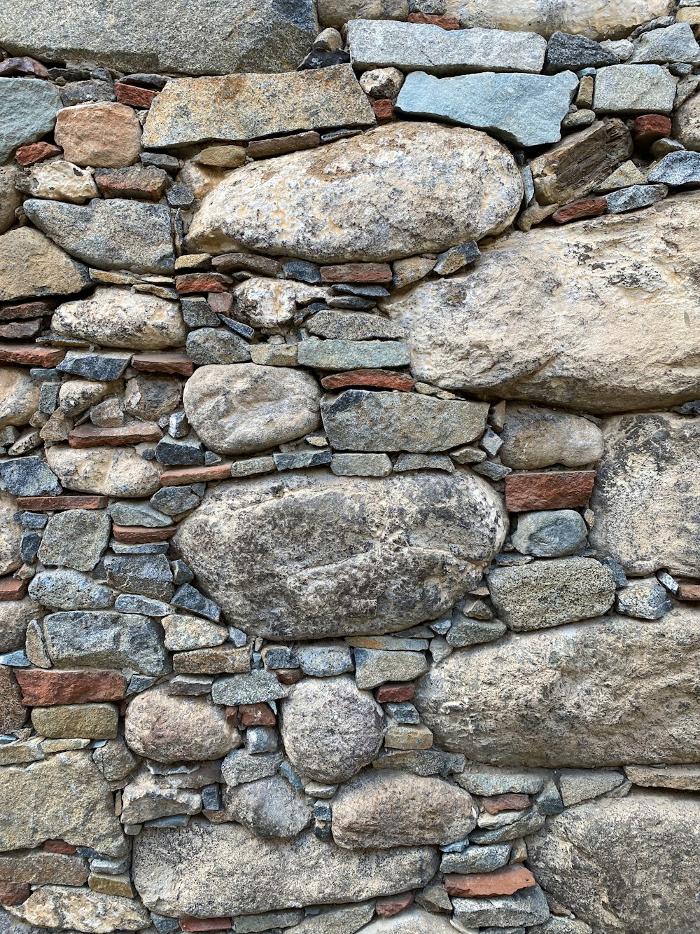 a stone wall made of rocks and stones