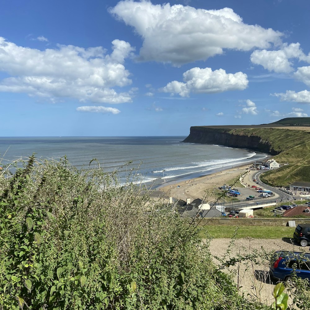 a view of a beach from a hill