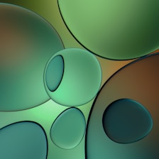 a close up of a cell phone with bubbles