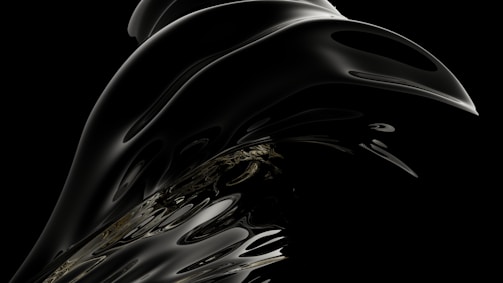 Abstract design featuring fluid forms in black.