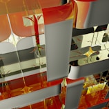 An intricate arrangement of reflective, geometric shapes with a glossy finish. The patterns appear to be made of interlocking panels in shades of silver, gold, and orange, creating a complex, abstract design with smooth curves and sharp edges.