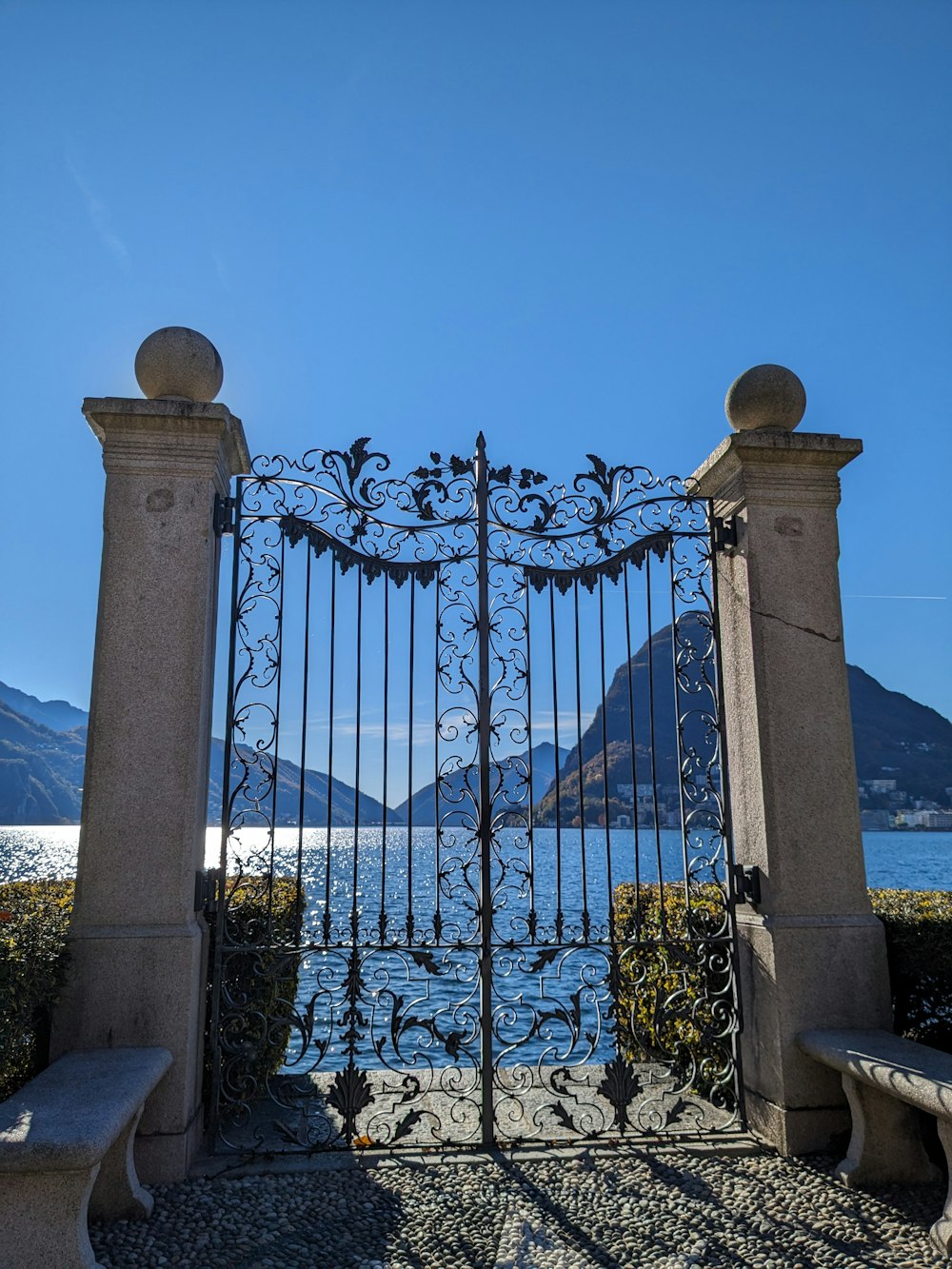 a gate with a bench in front of it