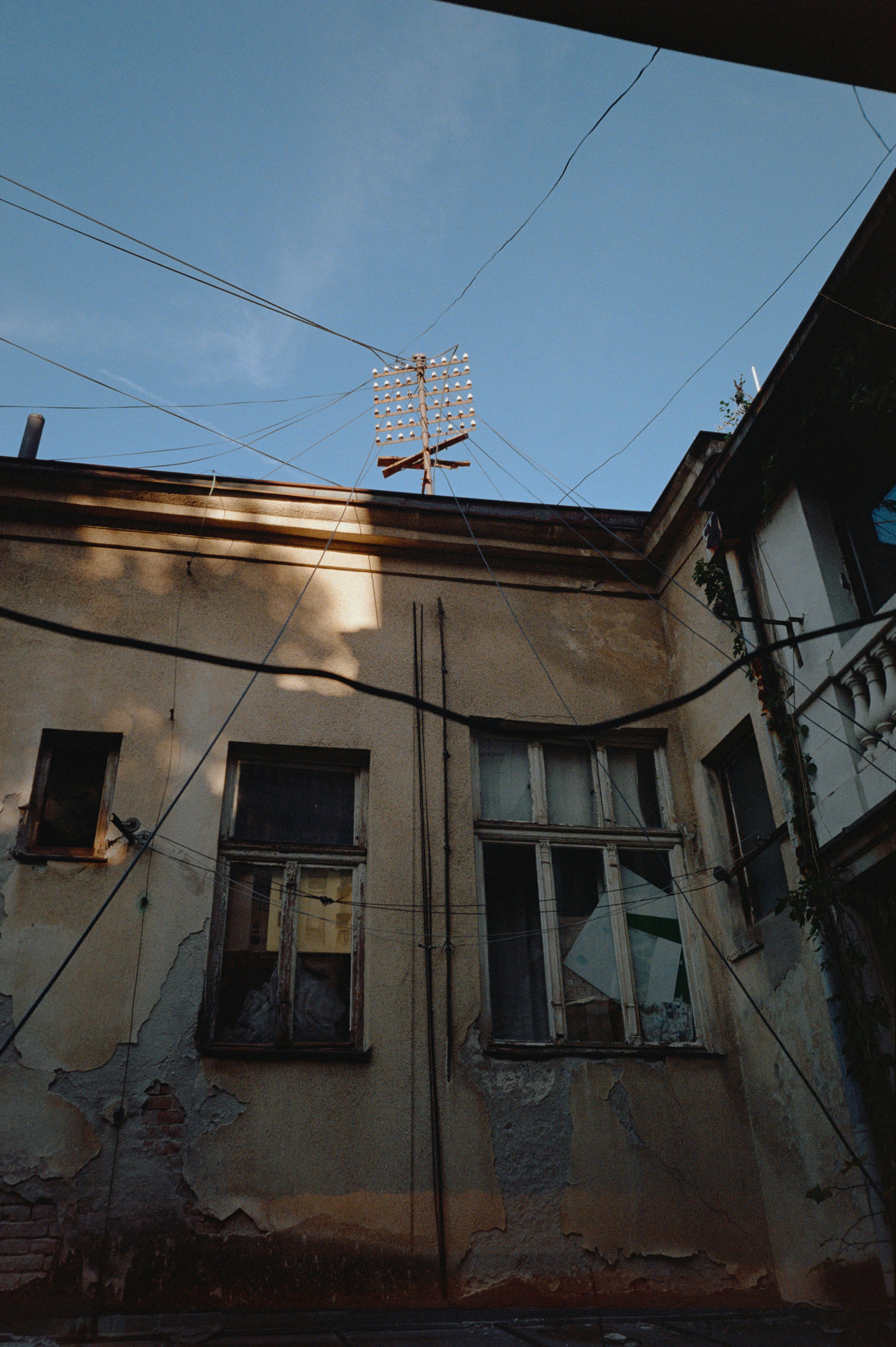 a building with a weather vane on top of it