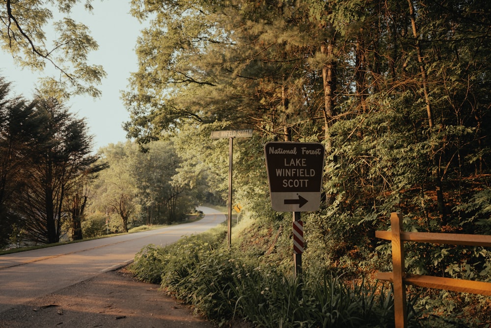 a road with a sign on the side of it