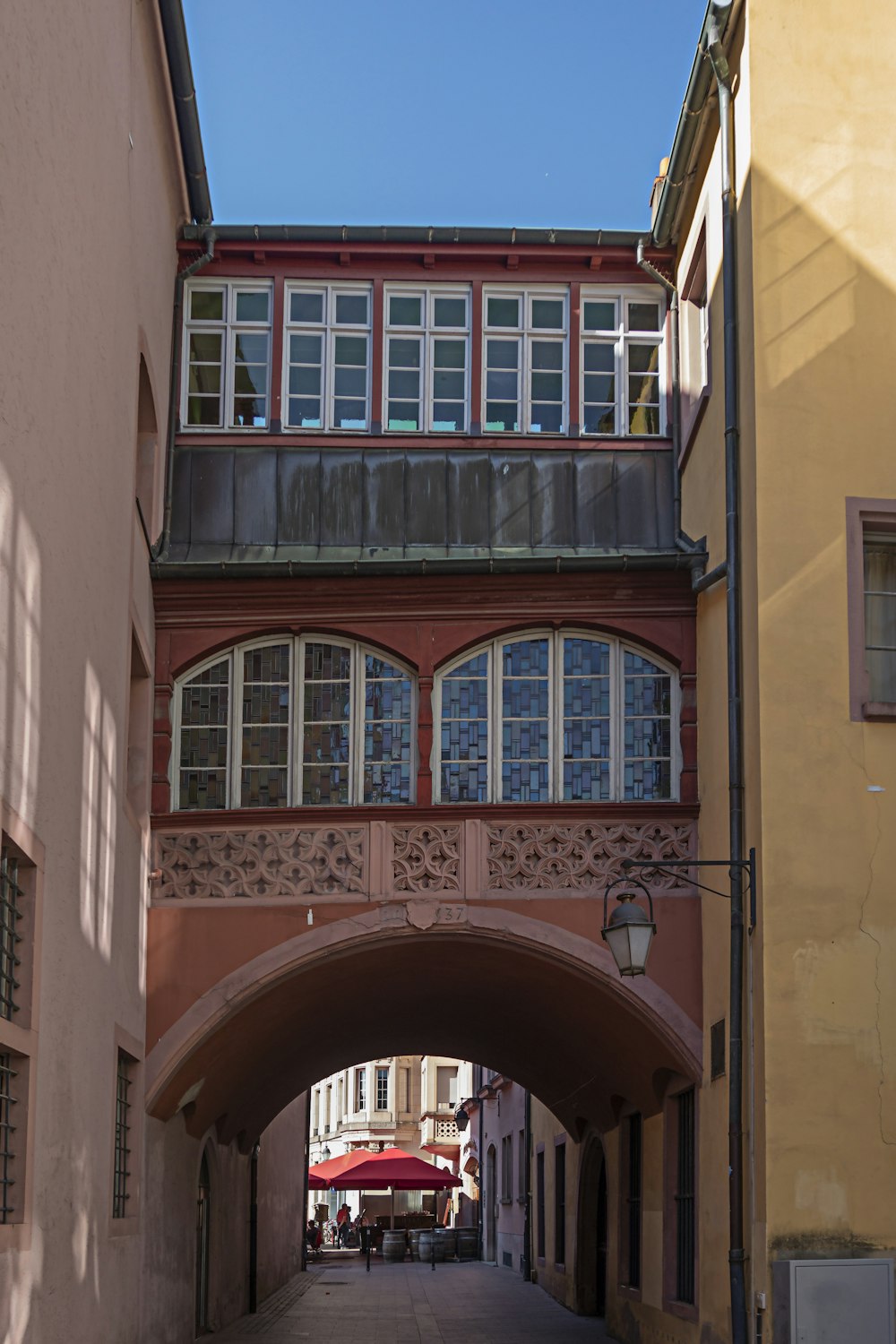 a bridge over a street in a city