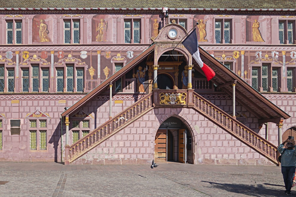 a large building with a clock on the front of it