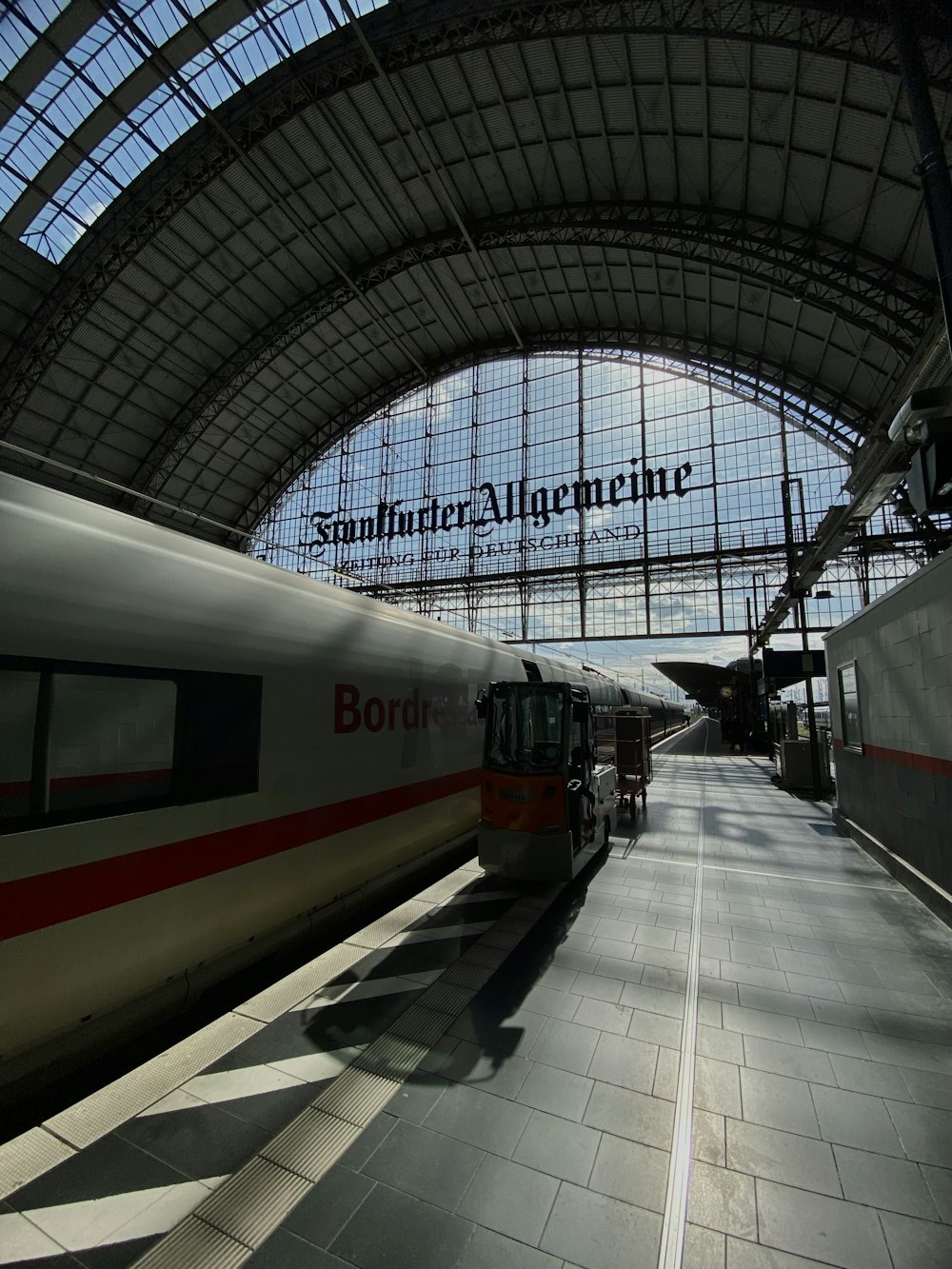 a train is pulling into a train station