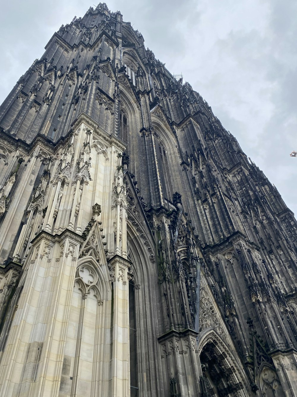 a very tall building with a clock on it's side