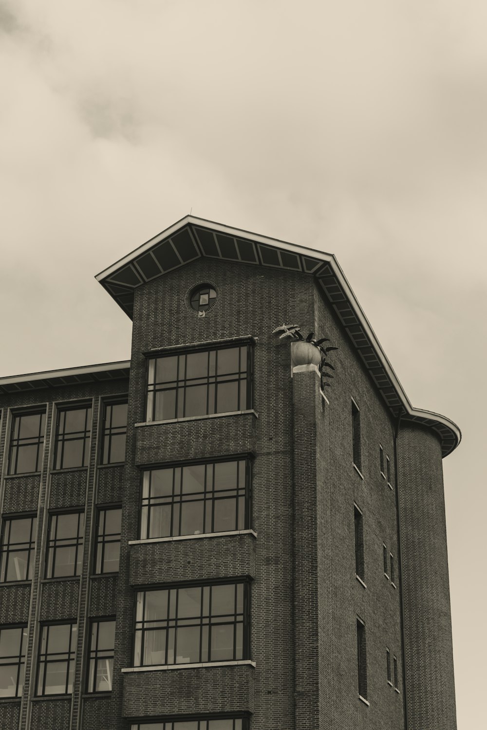 a black and white photo of a tall building