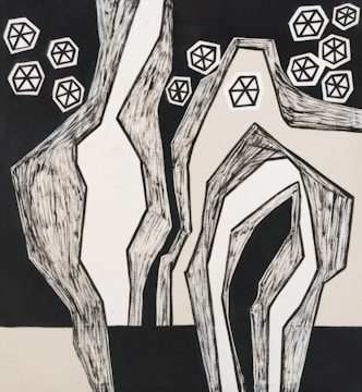 Abstract geometric shapes in monochrome with sharp contrasts.