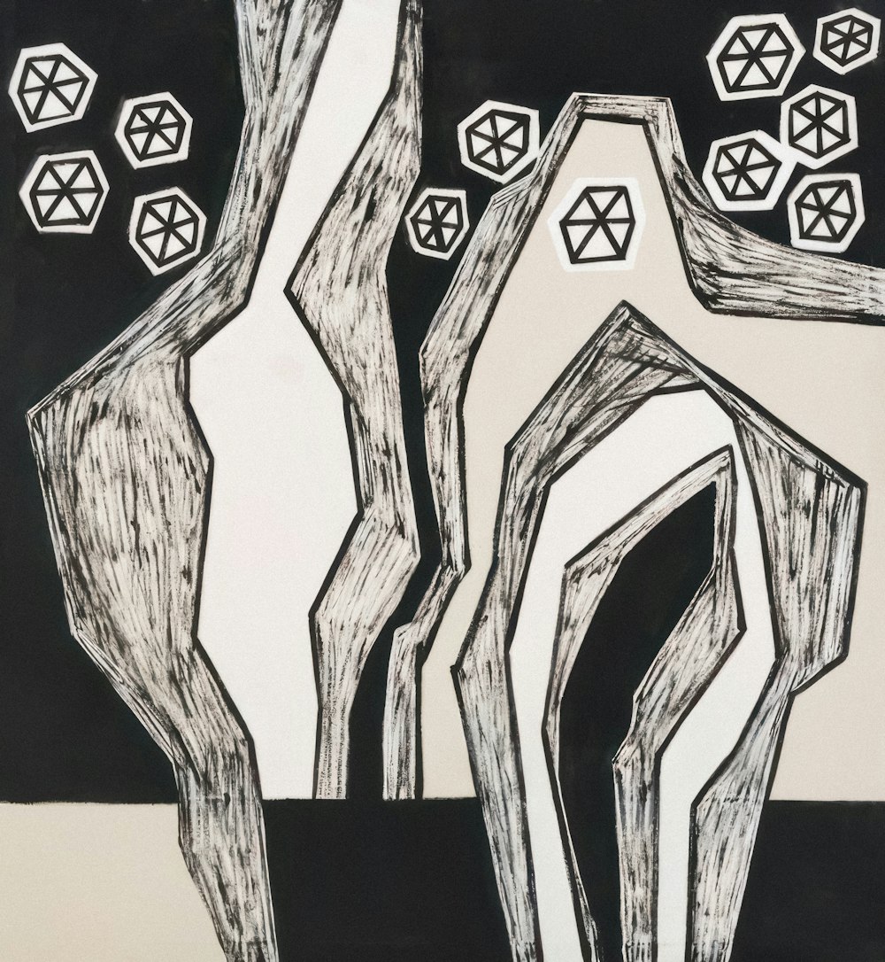 a black and white drawing of two trees