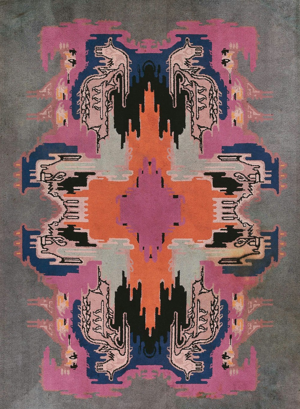 a multicolored rug with a design on it