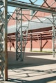 a large metal structure sitting in a parking lot