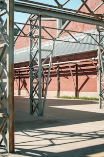 a large metal structure sitting in a parking lot