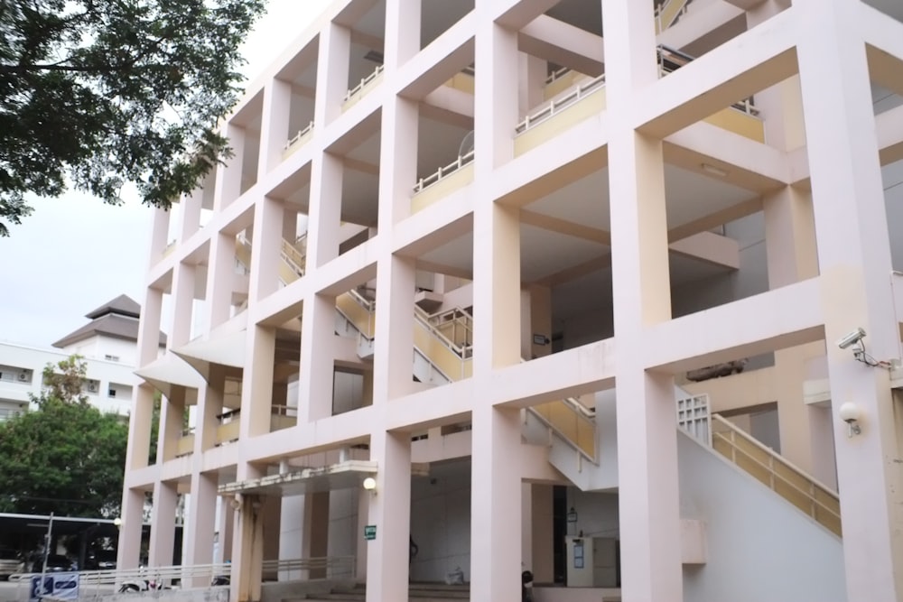 a large building with multiple balconies and stairs