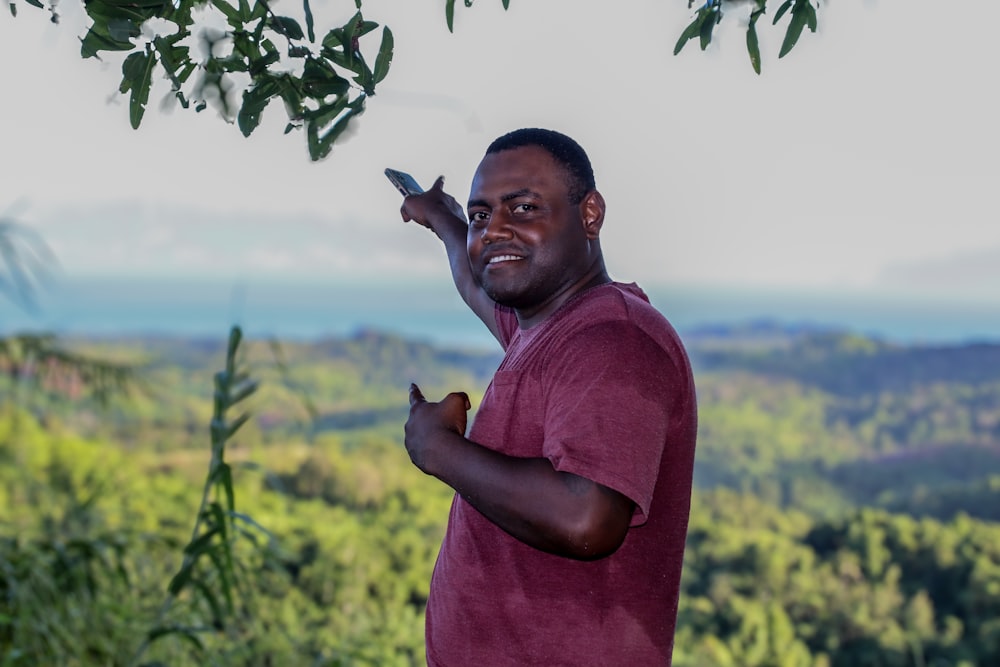 a man holding a cell phone up to his ear