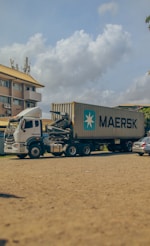 a semi truck with a large container on the back of it