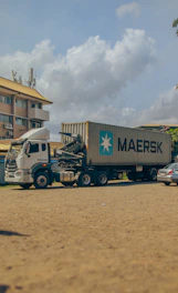a semi truck with a large container on the back of it