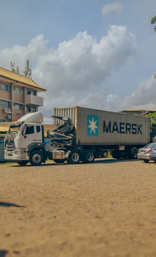 a semi truck with a large container on the back of it
