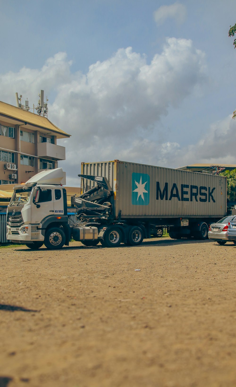 a semi truck with a large container on the back of it