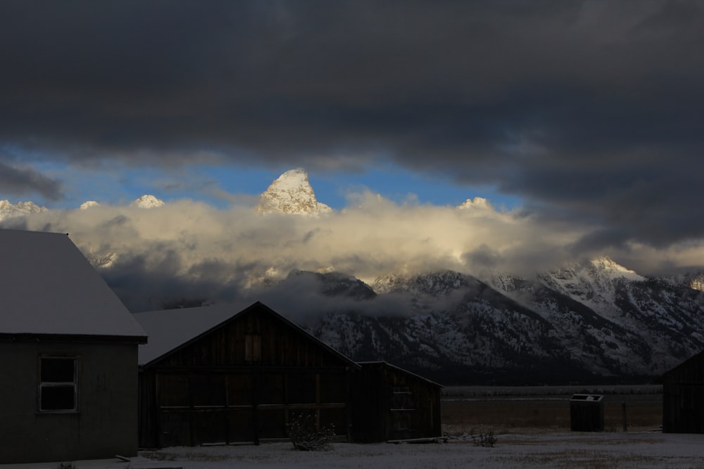 a snow covered mountain range in the distance