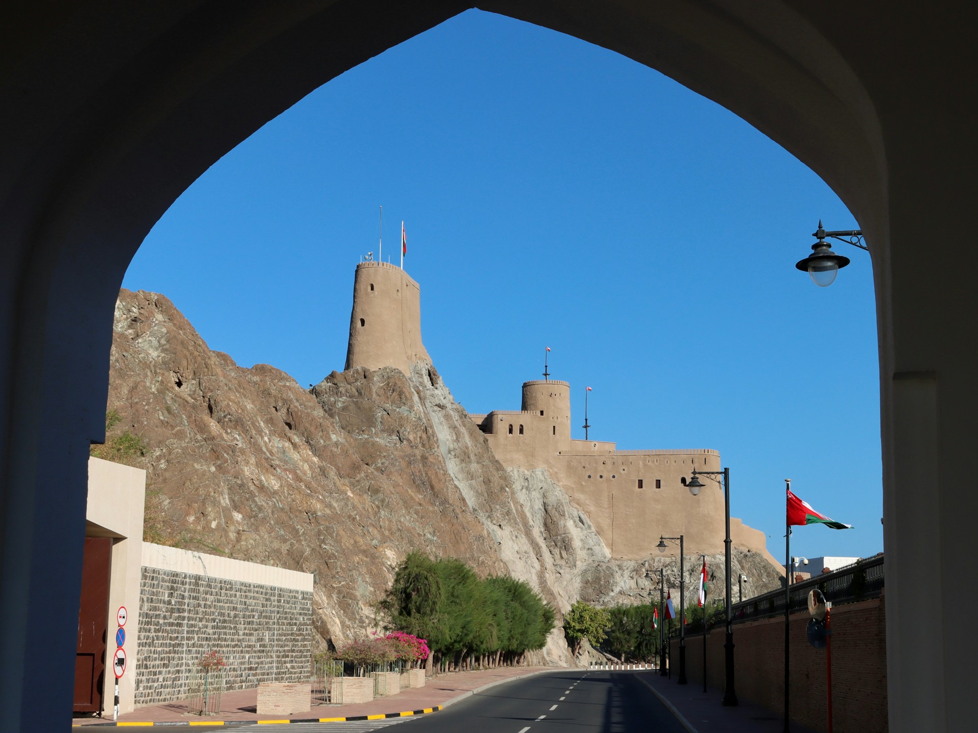 a view of a castle through an archway
