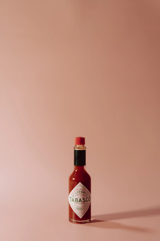Bottle on a coral backdrop