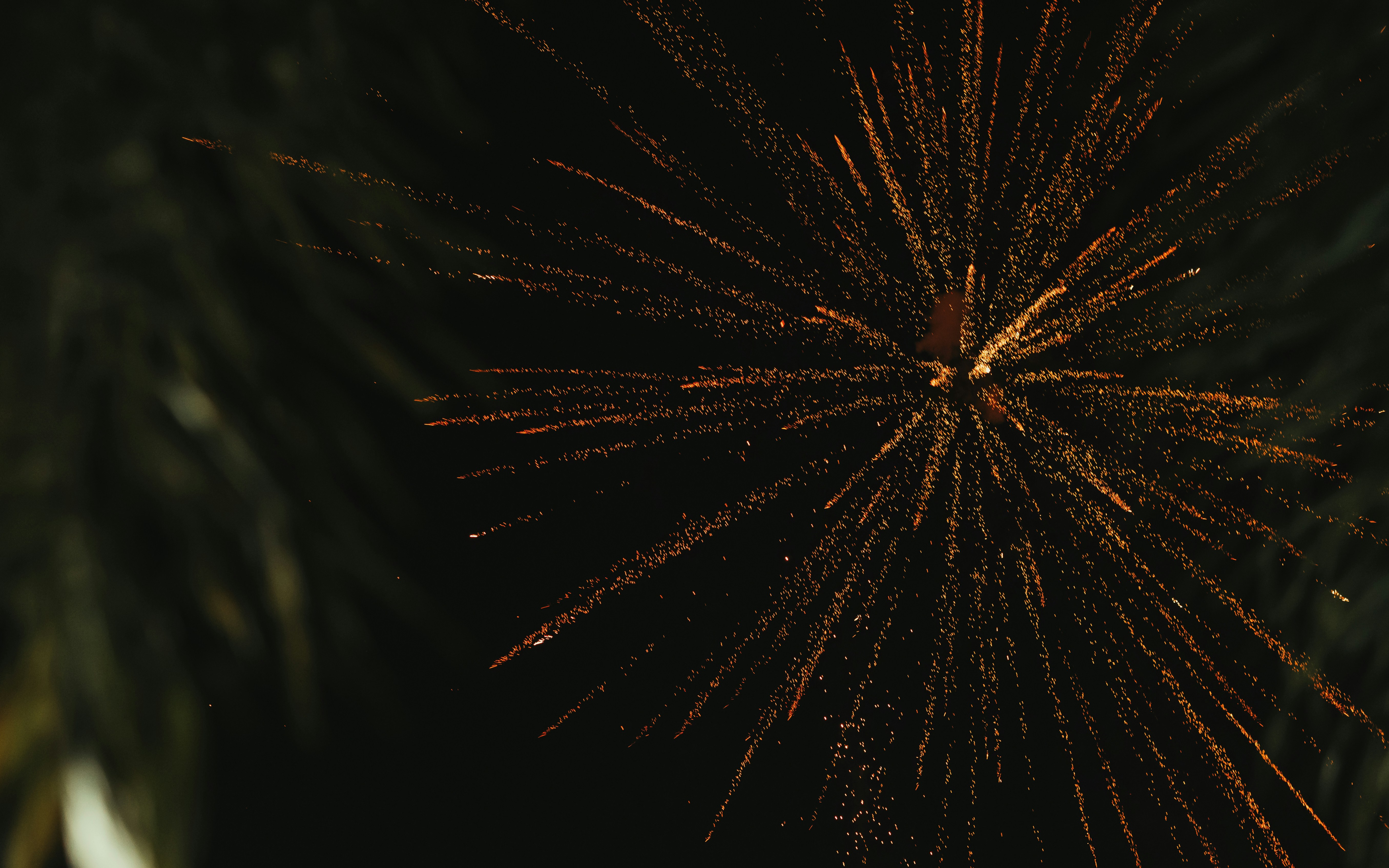 a close up of a firework in the night sky