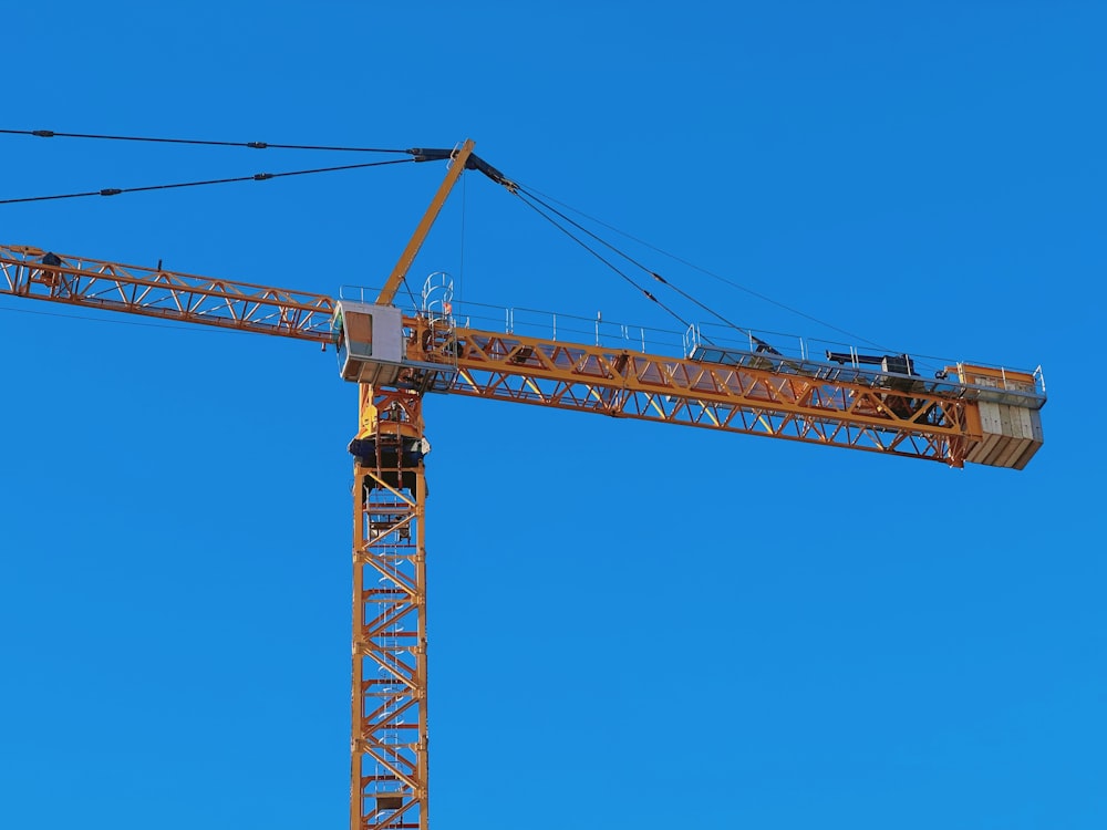 a crane that is standing in the sky