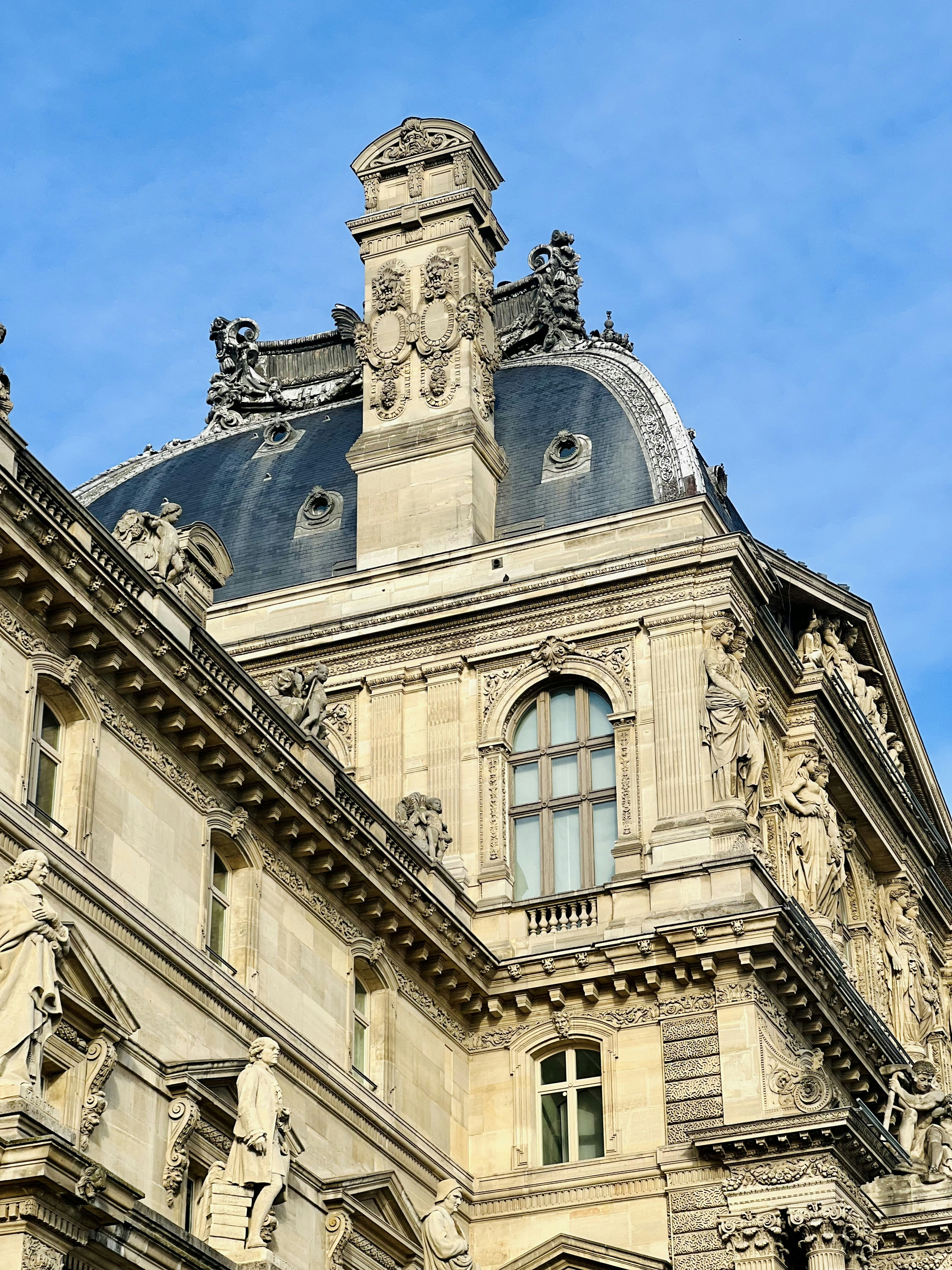 a large building with a clock on the top of it