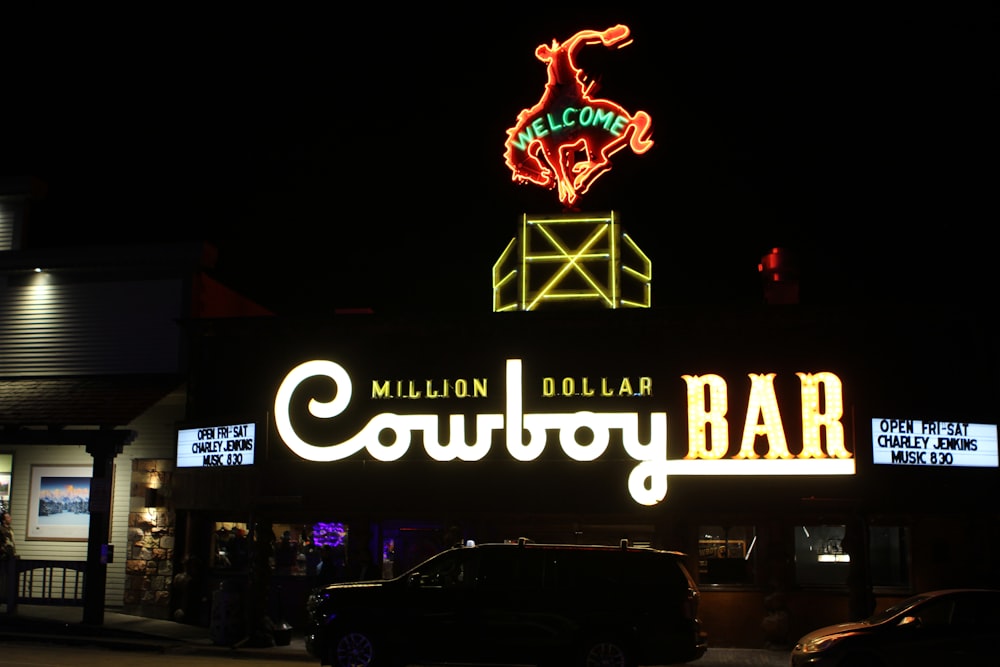 a neon sign on the side of a building