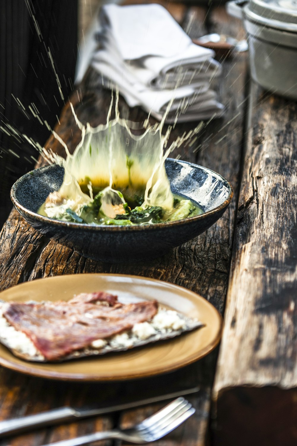 a plate of food on a wooden table