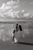 Couple enjoying a romantic dinner on the beach.
