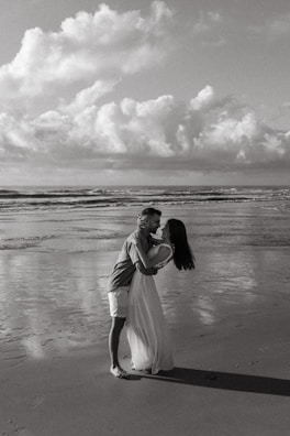 Couple enjoying a romantic dinner on the beach.
