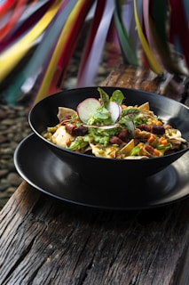 a plate of food on a wooden table