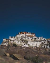 a mountain with a bunch of buildings on top of it
