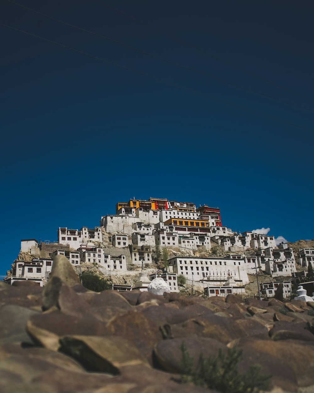 a mountain with a bunch of buildings on top of it