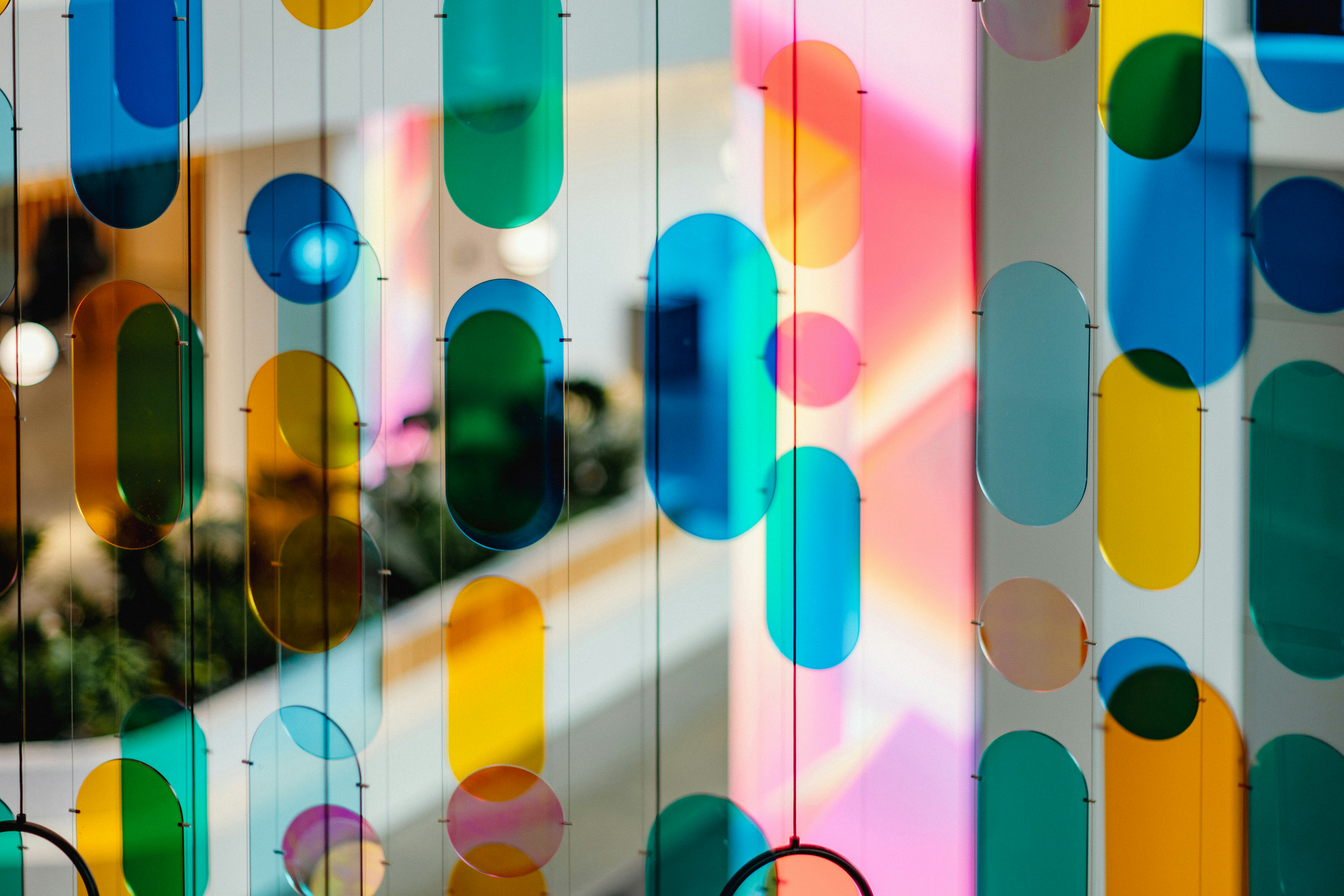 A vibrant and interactive art installation, possibly at the WNDR Museum, with glowing colors and reflections - Chicago West Loop attractions