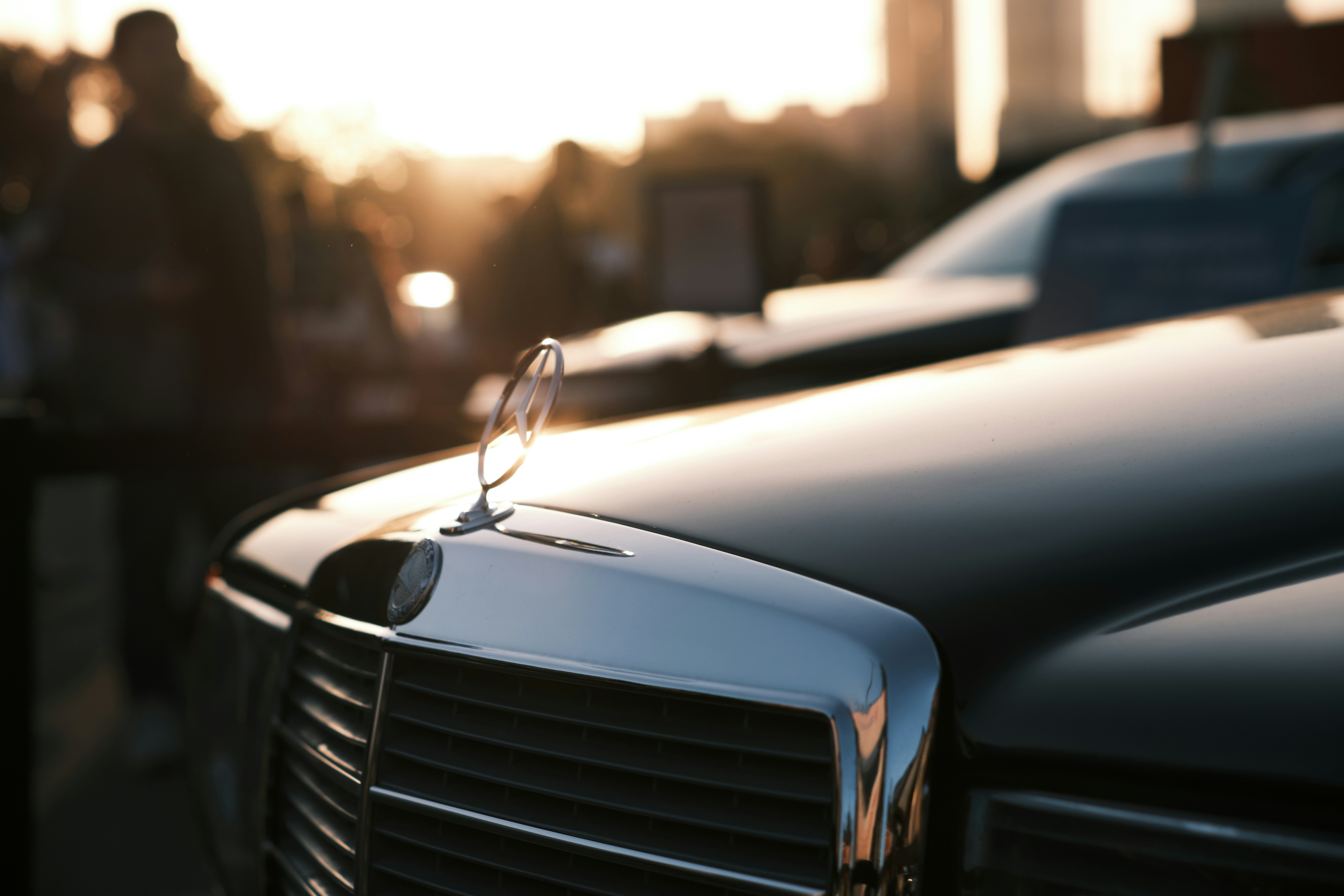 a close up of a mercedes emblem on a car