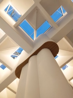 Industrial warehouse with clean lines and deep blue structural elements.