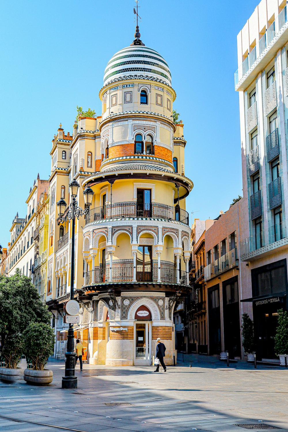 a tall building with a dome on top of it