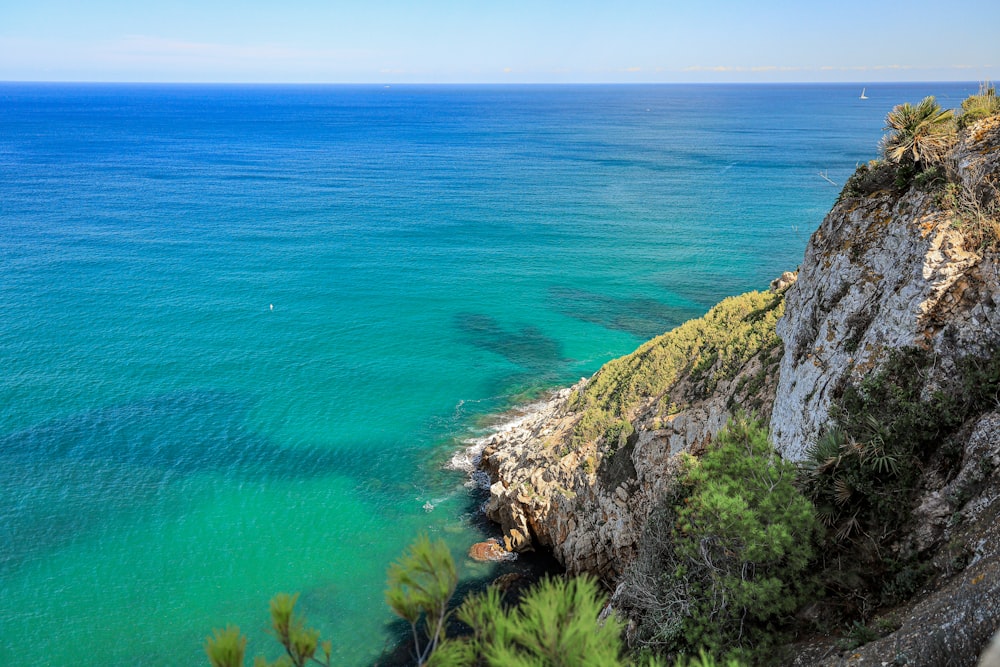 a view of the ocean from a cliff