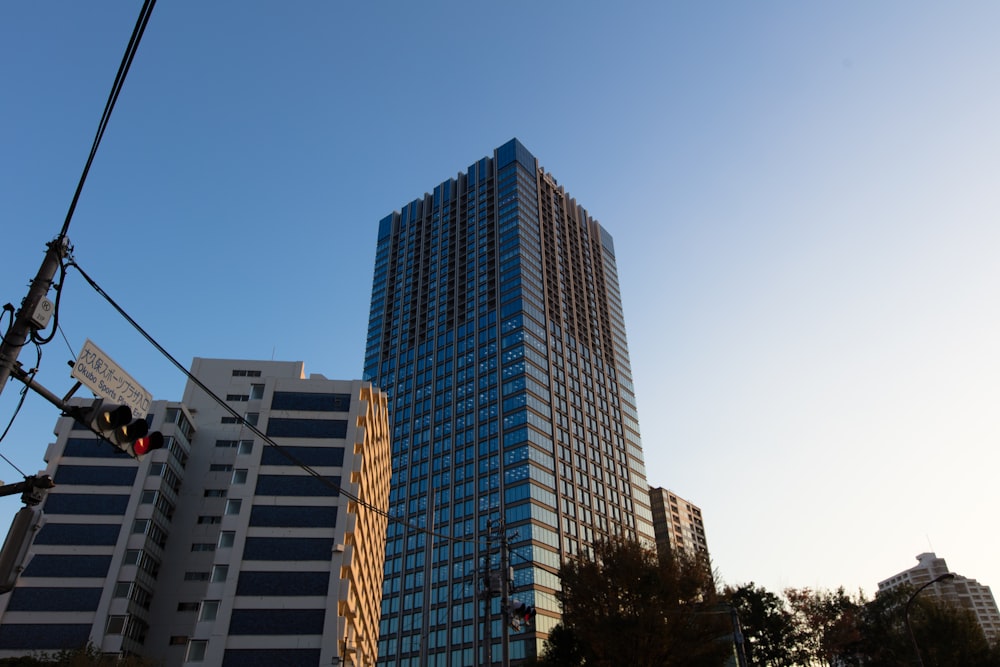 a tall building sitting next to a traffic light