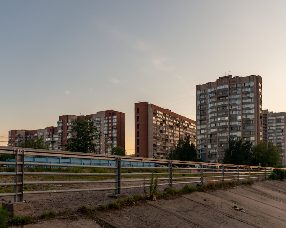 a row of tall buildings sitting next to each other