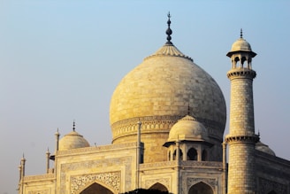 Historic Mughal architecture with intricate designs and grand domes.