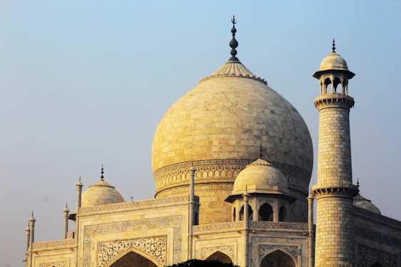 Historic Mughal architecture with intricate designs and grand domes.