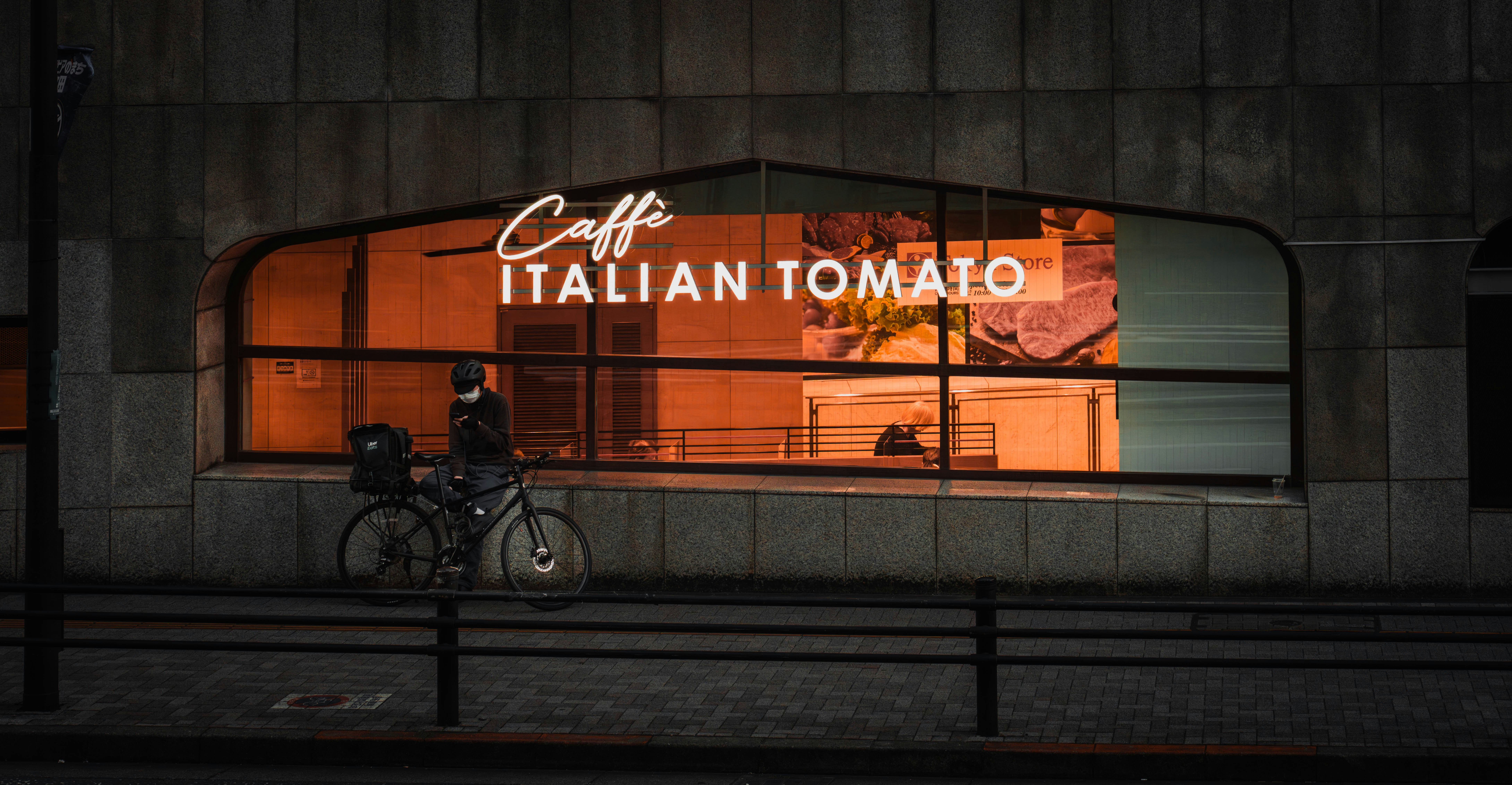 a bicycle parked in front of a building