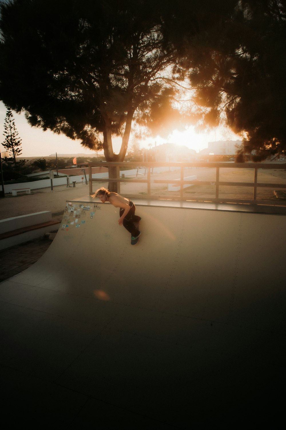 a person riding a skate board on a ramp